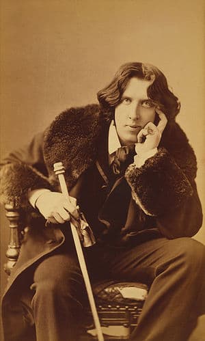 Three quarter length portrait of Oscar Wilde (...