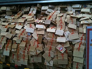 English: A wall of "ema" votive plat... English: A wall of "ema" votive plat...